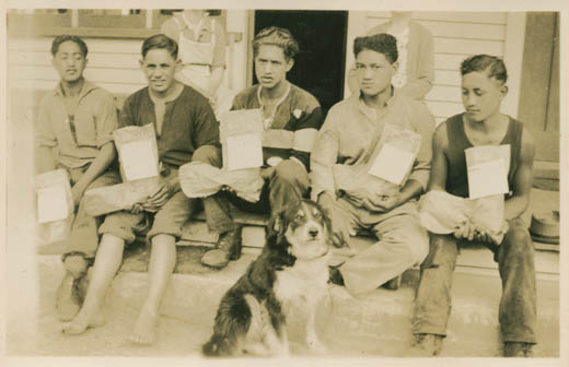 Boys from the Maori Boy’s Farm at Te Whaiti with their Christmas stockings, Christmas morning, 1944.