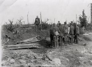 Rev. D. C. Herron conducting a military funeral at Dommcourt, France, in 1918.